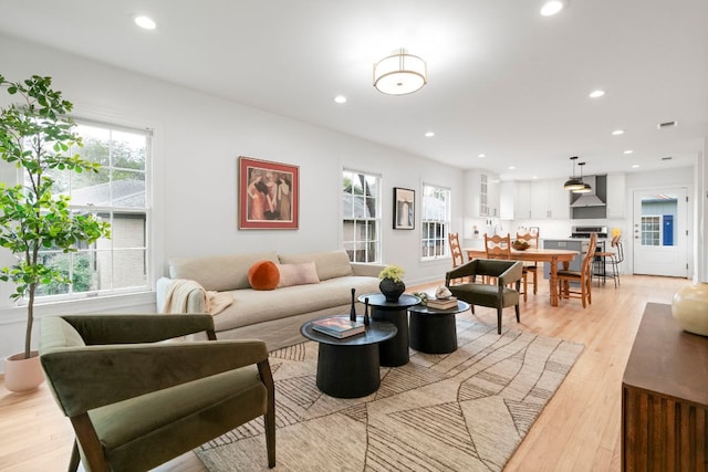 502 E 46th St, Austin, TX 78751 - living room featuring light wood finished floors and recessed lighting
