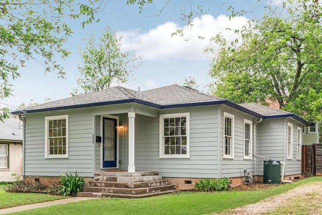 502 E 46th St, Austin, TX 78751 - bungalow-style house with crawl space, a front lawn, and a shingled roof