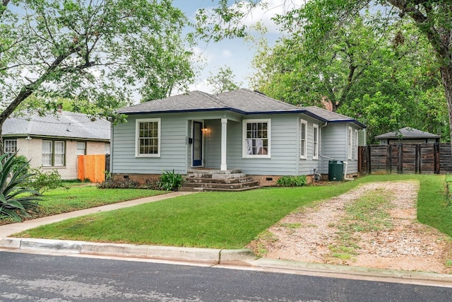 502 E 46th St, Austin, TX 78751 - bungalow-style home featuring crawl space, a shingled roof, and dirt driveway