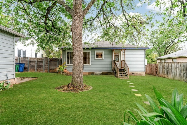 502 E 46th St, Austin, TX 78751 - rear view of property featuring a fenced backyard and crawl space