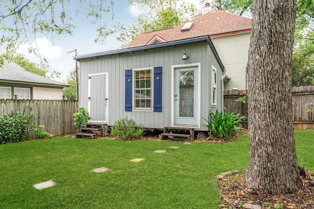 502 E 46th St, Austin, TX 78751 - view of outdoor structure with entry steps and a fenced backyard