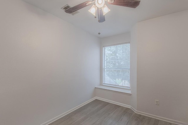 3300 Forest Creek Dr Unit 45, Round Rock, TX 78664 - empty room featuring wood finished floors and ceiling fan