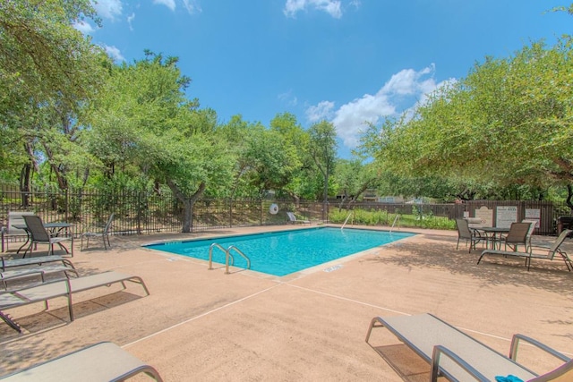 3300 Forest Creek Dr Unit 45, Round Rock, TX 78664 - community pool with a patio area and view of scattered trees