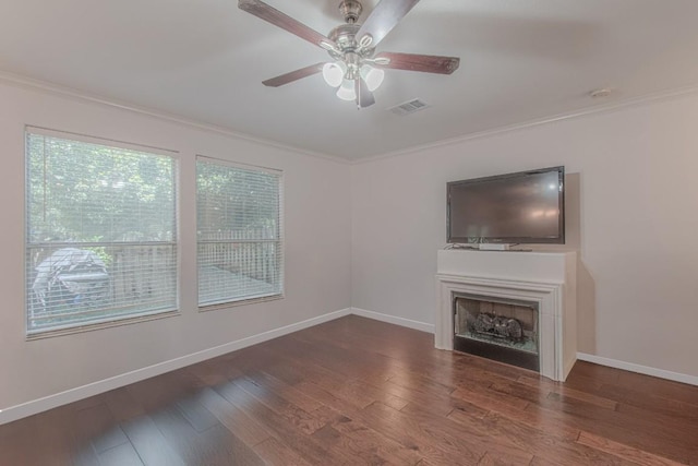 3300 Forest Creek Dr Unit 45, Round Rock, TX 78664 - unfurnished living room with ornamental molding, ceiling fan, wood finished floors, and a fireplace