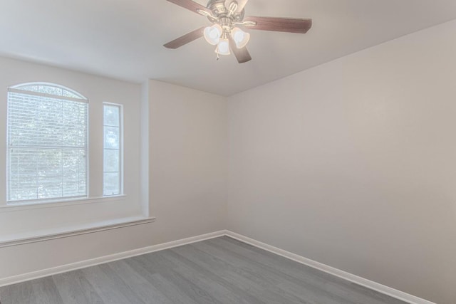 3300 Forest Creek Dr Unit 45, Round Rock, TX 78664 - spare room featuring wood finished floors and ceiling fan