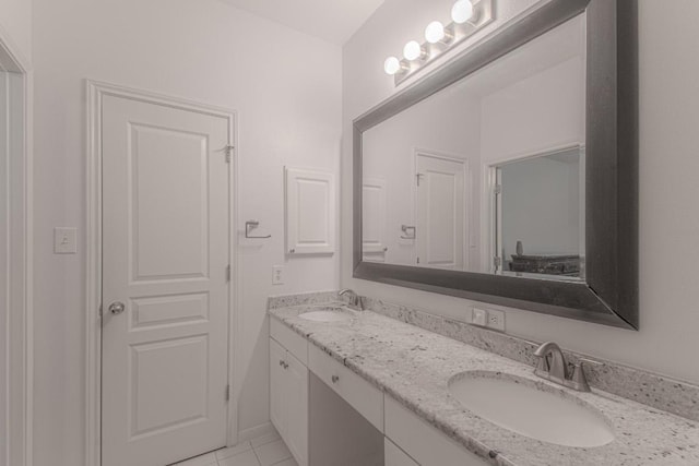 3300 Forest Creek Dr Unit 45, Round Rock, TX 78664 - bathroom with double vanity and tile patterned flooring
