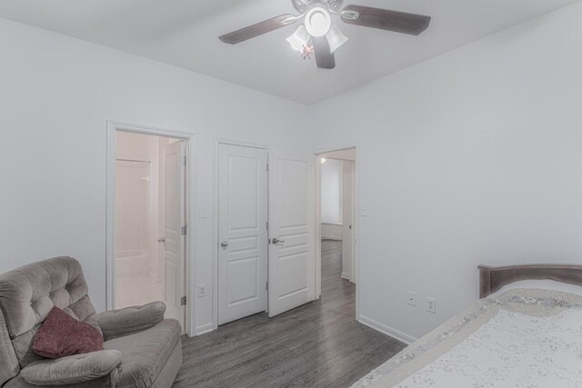 3300 Forest Creek Dr Unit 45, Round Rock, TX 78664 - bedroom featuring wood finished floors, connected bathroom, and ceiling fan