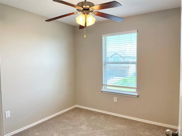 139 Diamondback Cv, Buda, TX 78610 - carpeted spare room featuring a ceiling fan and baseboards