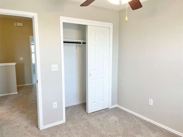 139 Diamondback Cv, Buda, TX 78610 - unfurnished bedroom featuring carpet, a closet, and ceiling fan