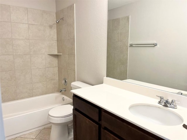 139 Diamondback Cv, Buda, TX 78610 - bathroom featuring vanity, washtub / shower combination, tile patterned flooring, and a textured wall