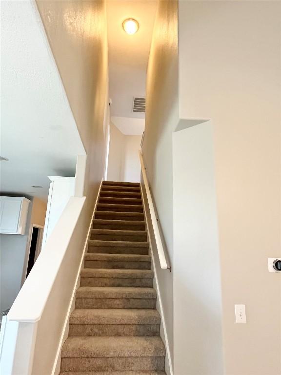 139 Diamondback Cv, Buda, TX 78610 - view of staircase