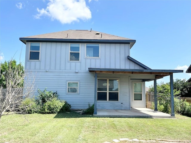 139 Diamondback Cv, Buda, TX 78610 - back of house featuring board and batten siding, a patio area, and roof with shingles
