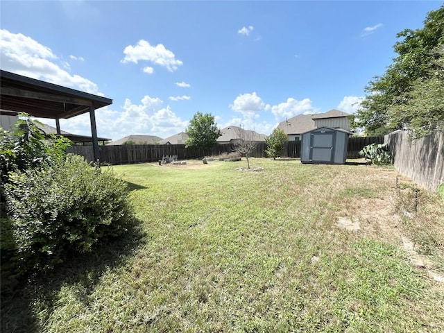 139 Diamondback Cv, Buda, TX 78610 - fenced backyard with a storage unit