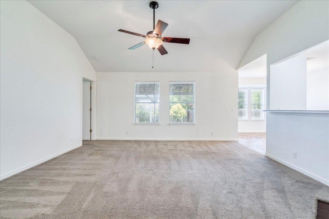 233 Sunshadow Dr, Lockhart, TX 78644 - carpeted spare room with lofted ceiling and ceiling fan