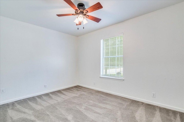 233 Sunshadow Dr, Lockhart, TX 78644 - carpeted empty room featuring baseboards and a ceiling fan