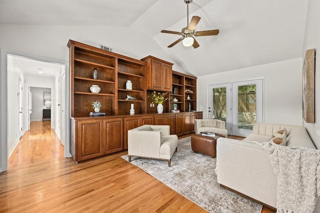 2507 Hartford Rd, Austin, TX 78703 - living area featuring vaulted ceiling, a ceiling fan, and light wood-style flooring