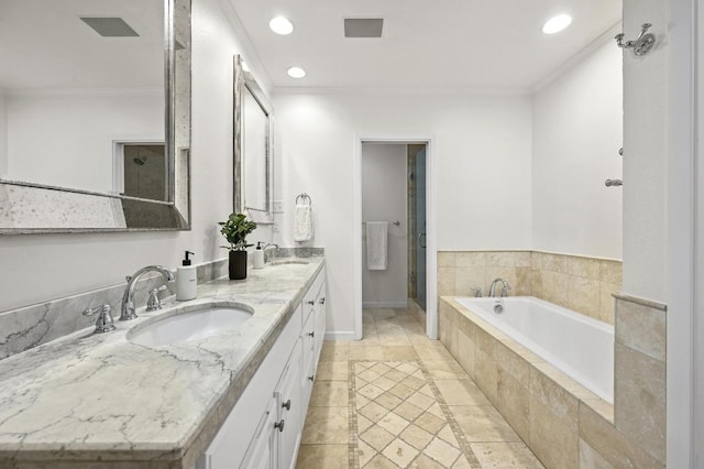 2507 Hartford Rd, Austin, TX 78703 - bathroom with ornamental molding, double vanity, a bath, recessed lighting, and a shower stall