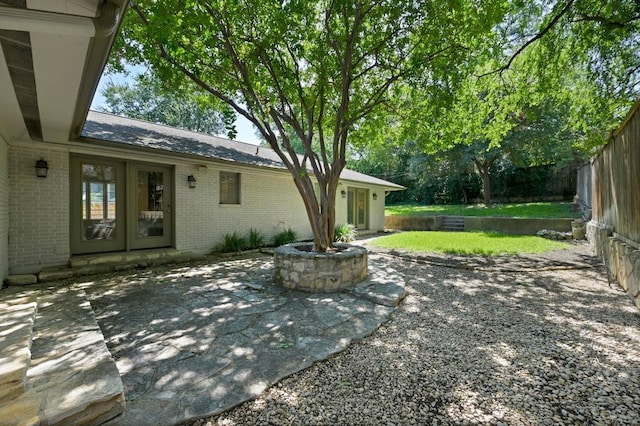 2507 Hartford Rd, Austin, TX 78703 - fenced backyard featuring a patio