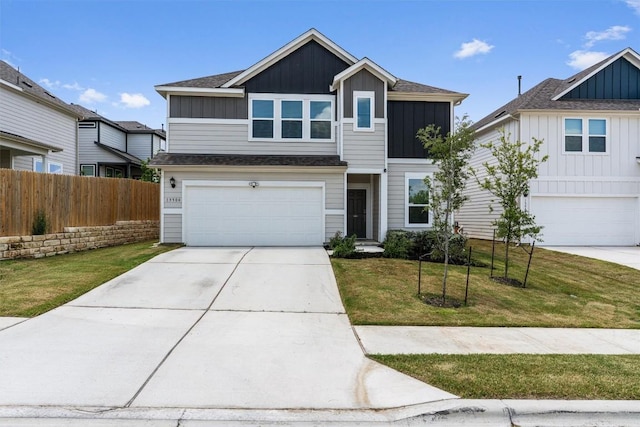 13506 Grand Central Dr, Pflugerville, TX 78660 - view of front of property with board and batten siding, an attached garage, and driveway