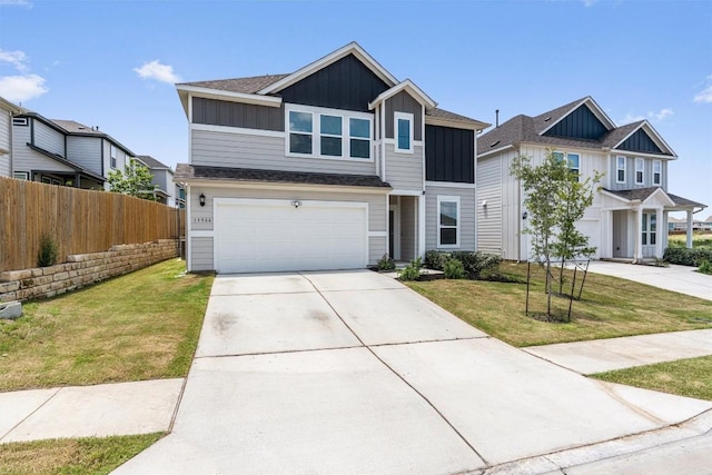 13506 Grand Central Dr, Pflugerville, TX 78660 - view of front of house with board and batten siding, concrete driveway, an attached garage, and roof with shingles