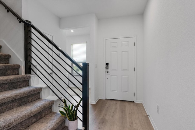 13506 Grand Central Dr, Pflugerville, TX 78660 - entrance foyer featuring stairs and light wood finished floors