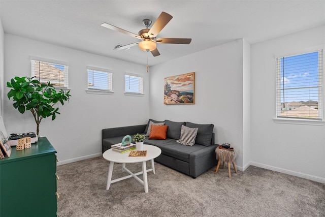 13506 Grand Central Dr, Pflugerville, TX 78660 - carpeted living area with a ceiling fan and baseboards