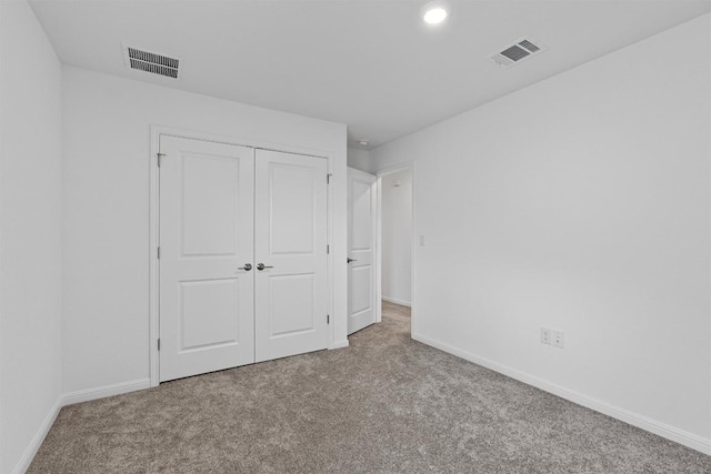 13506 Grand Central Dr, Pflugerville, TX 78660 - unfurnished bedroom with carpet, a closet, and recessed lighting