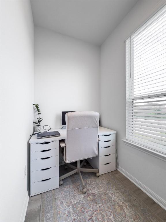 13506 Grand Central Dr, Pflugerville, TX 78660 - office area featuring healthy amount of natural light and light wood-type flooring