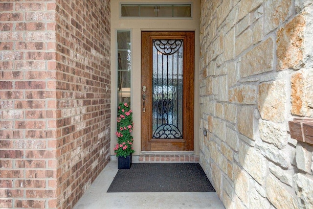 5521 Texas Bluebell Dr, Spicewood, TX 78669 - entrance to property with brick siding