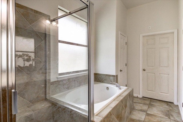 5521 Texas Bluebell Dr, Spicewood, TX 78669 - full bath featuring a bath and a tile shower