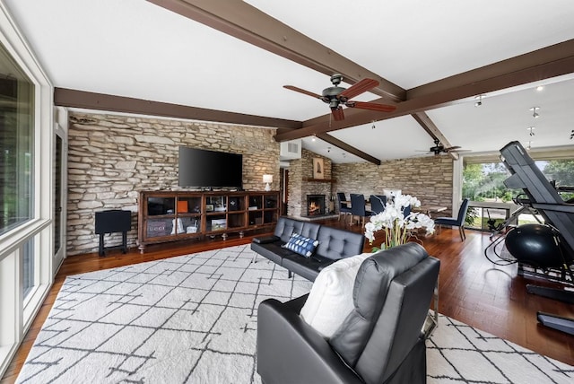 1200 Redbud Trl, West Lake Hills, TX 78746 - living room featuring a ceiling fan, a large fireplace, wood finished floors, and beamed ceiling
