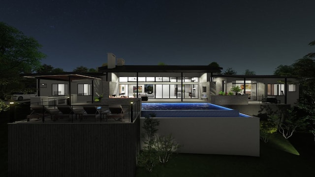 1200 Redbud Trl, West Lake Hills, TX 78746 - back of house at twilight with a pool, a balcony, and a patio area