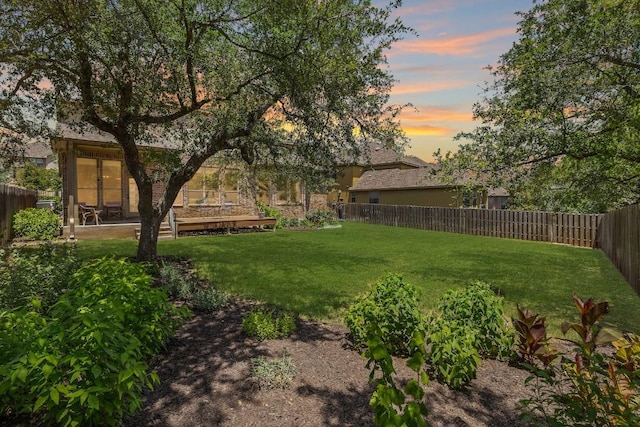 8709 Fescue Ln, Austin, TX 78738 - yard at dusk featuring a fenced backyard