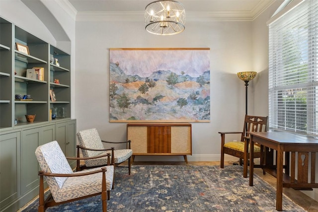 8709 Fescue Ln, Austin, TX 78738 - sitting room featuring a chandelier, ornamental molding, and wood finished floors