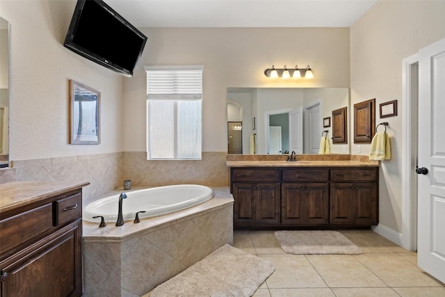 8709 Fescue Ln, Austin, TX 78738 - full bath featuring vanity, a bath, and tile patterned floors