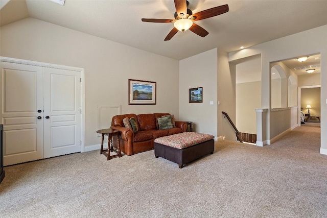 8709 Fescue Ln, Austin, TX 78738 - living room with carpet flooring, vaulted ceiling, and ceiling fan