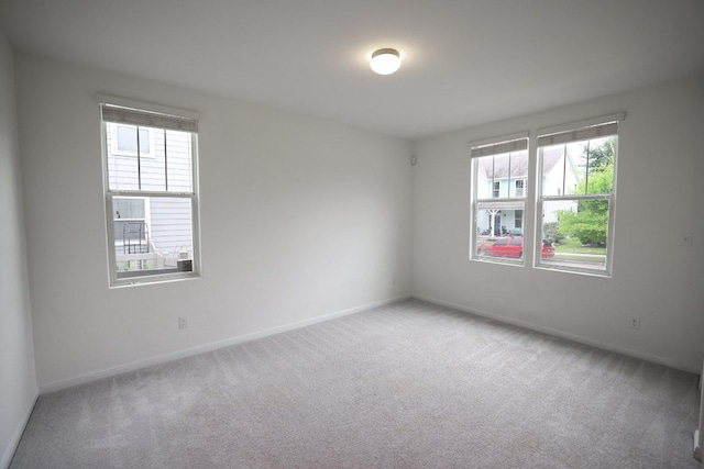151 Campos, Kyle, TX 78640 - spare room featuring light colored carpet