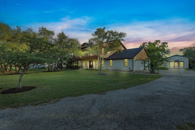 13100 N Ridge Cir, Leander, TX 78641 - view of front of house with a front lawn, concrete driveway, and an attached garage