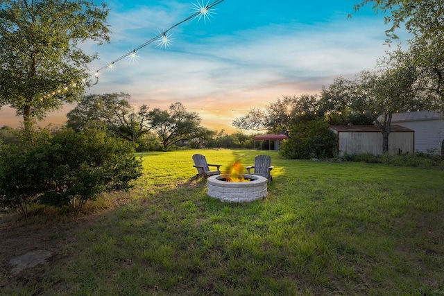13100 N Ridge Cir, Leander, TX 78641 - view of green lawn featuring an outdoor fire pit