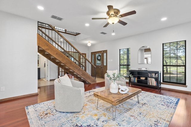 13100 N Ridge Cir, Leander, TX 78641 - living area with stairs, wood finished floors, a ceiling fan, and recessed lighting
