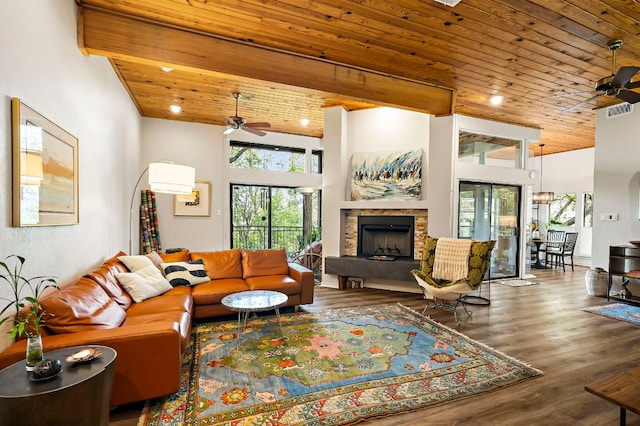 8200 Neely Dr Unit 119, Austin, TX 78759 - living room featuring ceiling fan, wooden ceiling, plenty of natural light, and a fireplace
