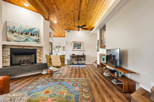 8200 Neely Dr Unit 119, Austin, TX 78759 - living room featuring wooden ceiling, wood finished floors, a stone fireplace, ceiling fan, and recessed lighting