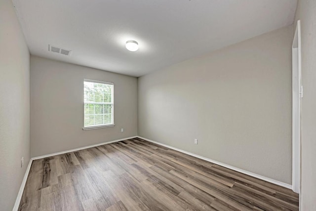 3417 Tralagon Trl, Pflugerville, TX 78660 - empty room with wood finished floors and baseboards