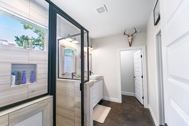 102 Moku Ct, Bastrop, TX 78602 - bathroom featuring vanity and finished concrete floors