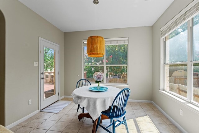 2611 Terlingua Dr, Cedar Park, TX 78613 - dining space featuring light tile patterned flooring and arched walkways