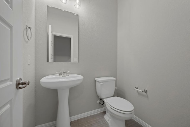 113 Swallowtail Dr, Austin, TX 78737 - half bathroom featuring toilet and wood finished floors