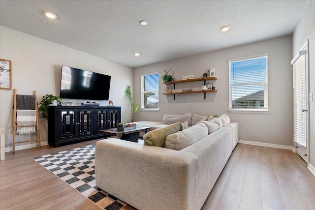 200 Mais Dr, Georgetown, TX 78626 - living room with light wood-type flooring and recessed lighting