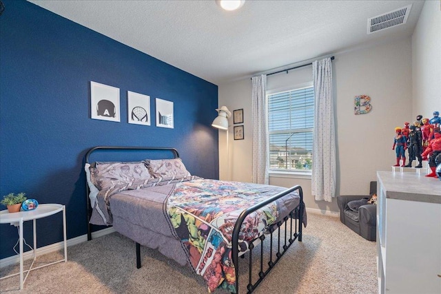 200 Mais Dr, Georgetown, TX 78626 - bedroom with carpet flooring and a textured ceiling