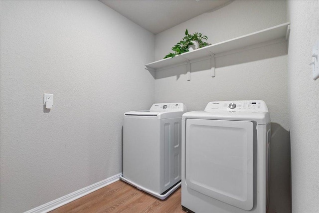200 Mais Dr, Georgetown, TX 78626 - laundry room featuring light wood finished floors and independent washer and dryer