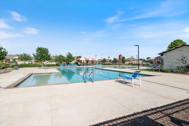 200 Mais Dr, Georgetown, TX 78626 - community pool with a patio area